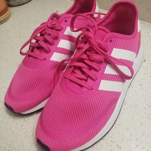 Woman's hot pink Adidas
